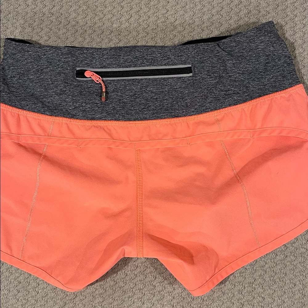 Peach low rise Lululemon shorts